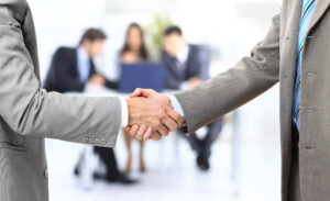 two men shaking hands